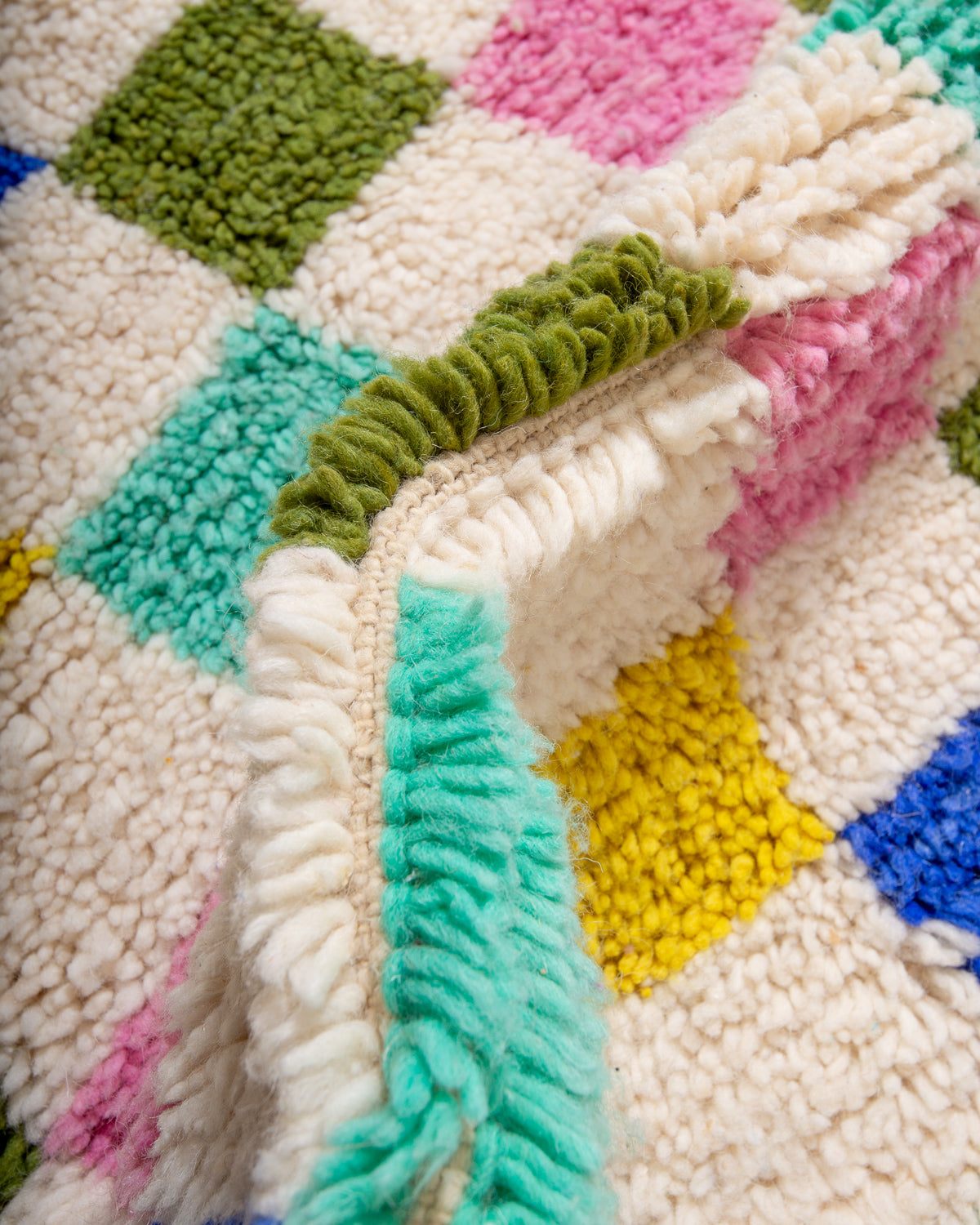 Modern, designer, handcrafted Berber rug from Morocco. Beniourain carpet with beautiful colours and patterns and fluffy wool texture.